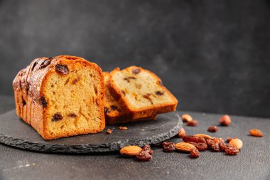 Meyveli kek tatlı meyveli pasta kurutulmuş meyveler, fındıklı geleneksel pişmiş yiyecekler doğal ürünler lezzetli çerezler lezzetli gurme yemek arkaplan masanın kırsal kesiminde fotokopi alanı