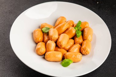 Sosis mini et porsiyon fast food doğal ürün lezzetli lezzetli gurme yemek arkaplan masa rustik üst görünüm fotokopi alanı