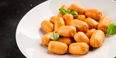 Sosis mini et porsiyon fast food doğal ürün lezzetli lezzetli gurme yemek arkaplan masa rustik üst görünüm fotokopi alanı