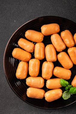 Sosis mini et porsiyon fast food doğal ürün lezzetli lezzetli gurme yemek arkaplan masa rustik üst görünüm fotokopi alanı