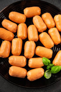Sosis mini et porsiyon fast food doğal ürün lezzetli lezzetli gurme yemek arkaplan masa rustik üst görünüm fotokopi alanı
