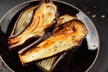 Baked eggplant grilled vegetables fresh natural product tasty snack delicious gourmet food background on the table rustic top view copy space keto and paleo diet vegan and vegan food