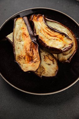 Baked eggplant grilled vegetables fresh natural product tasty snack delicious gourmet food background on the table rustic top view copy space keto and paleo diet vegan and vegan food