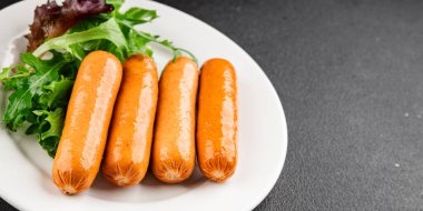 Sosis vejetaryen soya eti, bitkisel gıda, fast food, lezzetli aperatifler, lezzetli gurme yemek arka planı, masadaki rustik üst görünüm fotokopi alanı keto, ya da paleo diyet vejetaryen ya da vejetaryen yemeği.