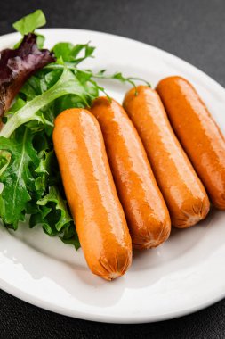 Sosis vejetaryen soya eti, bitkisel gıda, fast food, lezzetli aperatifler, lezzetli gurme yemek arka planı, masadaki rustik üst görünüm fotokopi alanı keto, ya da paleo diyet vejetaryen ya da vejetaryen yemeği.