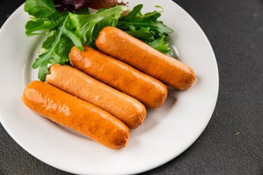 Sosis vejetaryen soya eti, bitkisel gıda, fast food, lezzetli aperatifler, lezzetli gurme yemek arka planı, masadaki rustik üst görünüm fotokopi alanı keto, ya da paleo diyet vejetaryen ya da vejetaryen yemeği.