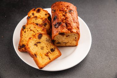 Meyveli kek tatlı meyveli pasta kurutulmuş meyveler, fındıklı geleneksel pişmiş yiyecekler doğal ürünler lezzetli çerezler lezzetli gurme yemek arkaplan masanın kırsal kesiminde fotokopi alanı