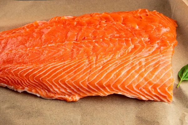 Salmon fillet raw red fish seafood dish natural tasty snack fresh delicious gourmet food background on the table rustic top view copy space pescetarian diet