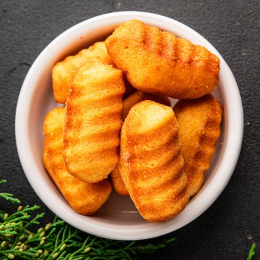 Madeleine tatlı bisküvi tatlı tatlı aperatif lezzetli leziz gurme yemek masası rustik yiyecekler üst görünüm fotokopi alanı