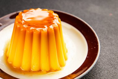 Flan dessert caramel pudding sweet dessert cream tasty snack fresh delicious gourmet food background on the table rustic food top view copy space