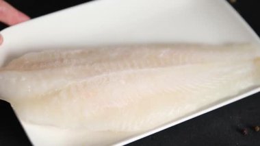 Donmuş balık fileto beyaz balık pangasius deniz ürünleri lezzetli leziz lezzetli gurme lezzetli diyet arka planı masadaki kırsal yemek üst görüşü uzay keto ve paleo diyet