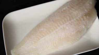 Donmuş balık fileto beyaz balık pangasius deniz ürünleri lezzetli leziz lezzetli gurme lezzetli diyet arka planı masadaki kırsal yemek üst görüşü uzay keto ve paleo diyet