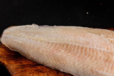 Donmuş balık fileto beyaz balık pangasius deniz ürünleri lezzetli leziz lezzetli gurme lezzetli diyet arka planı masadaki kırsal yemek üst görüşü uzay keto ve paleo diyet