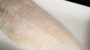 Donmuş balık fileto beyaz balık pangasius deniz ürünleri lezzetli gurme lezzetli pezetaryan diyet arka planı masadaki kırsal yiyecekler üst görünüm uzay keto ve paleo diyet