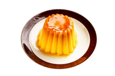 Flan tatlısı karamel pudingi tatlı tatlı tatlı krema lezzetli aperatif lezzetli gurme yemek arkaplanı masa kırsal yiyeceklerin üst görüntüsü fotokopi alanı.