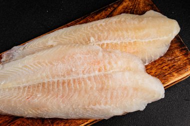 Donmuş balık fileto beyaz balık pangasius deniz ürünleri lezzetli leziz lezzetli gurme lezzetli diyet arka planı masadaki kırsal yemek üst görüşü uzay keto ve paleo diyet