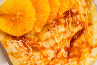 Portakallı krep tatlı krep lezzetli aperatif lezzetli gurme yemek arkaplanı masa kırsal gıdanın üstünde fotokopi odası