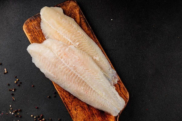 Donmuş balık fileto beyaz balık pangasius deniz ürünleri lezzetli leziz lezzetli gurme lezzetli diyet arka planı masadaki kırsal yemek üst görüşü uzay keto ve paleo diyet