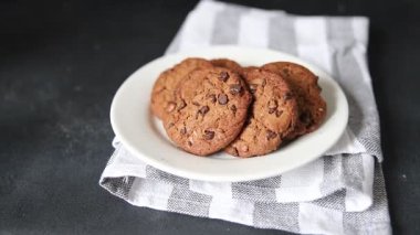 Çikolatalı kurabiyeler, tatlı tatlı ev yapımı, lezzetli çerezler, lezzetli gurme yemek arkaplanı, masa üstü kırsal yiyecekler, fotokopi uzayı pazarlama konsepti.