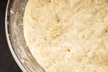 Çiğ hamur mayası mayalı mayalı başlangıç lezzetli aperatif taze gurme yemek arkaplanı masa rustik gıda üst görünümü fotokopi uzay pazarlama konsepti fotoğrafı