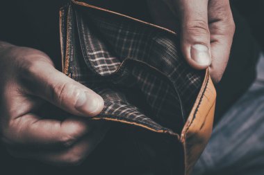 Man Showing His Empty Wallet - No Money Left Concept clipart