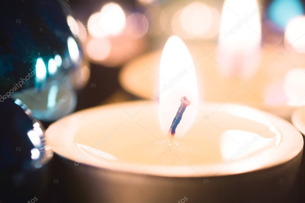 Relaxing Tealight With A Bokeh Of Several Candles