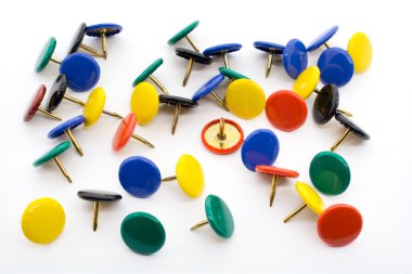 Macro Shot of A Collection of Colored Thumbtacks clipart