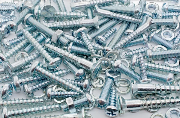 Makro duży zbiór żelaza śruby, nakrętki i lockwashers — Zdjęcie stockowe