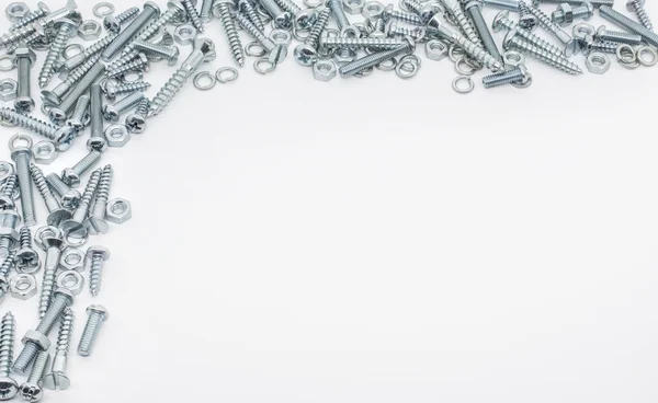 Collection Of Iron Screws, Nuts and Lockwashers At The Edge — Stock Photo, Image