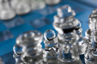Focus On Pawn On Blue Checkerboard
