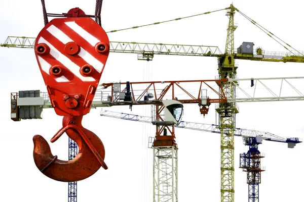 The hook of the elevating crane on a background of construction — Stock Photo, Image