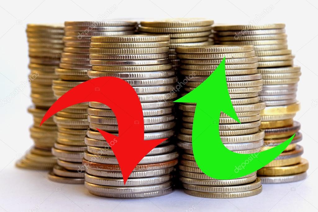 Red and green arrow on the background of coins
