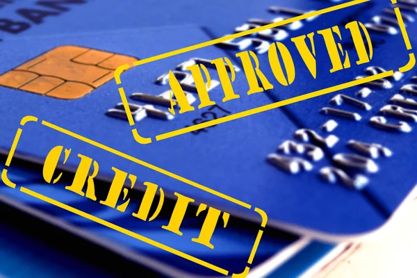 Credit card and the stamp "credit" , "approved" . — Stock Photo, Image