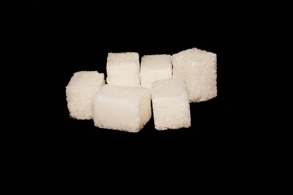 Cukier Izolowany Czarnym Tle — Zdjęcie stockowe