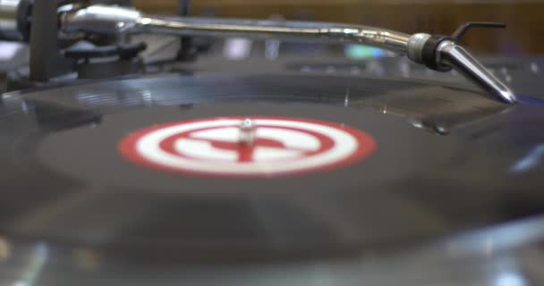 DJ Turntable and Vinyl Record Closing Up — стоковое видео