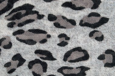 Delikli, beyaz kumaş doku düzensiz şekil siyah ve kahverengi lekeler şeklinde desen. Duvar kağıdı için kumaş dokusu. Portre