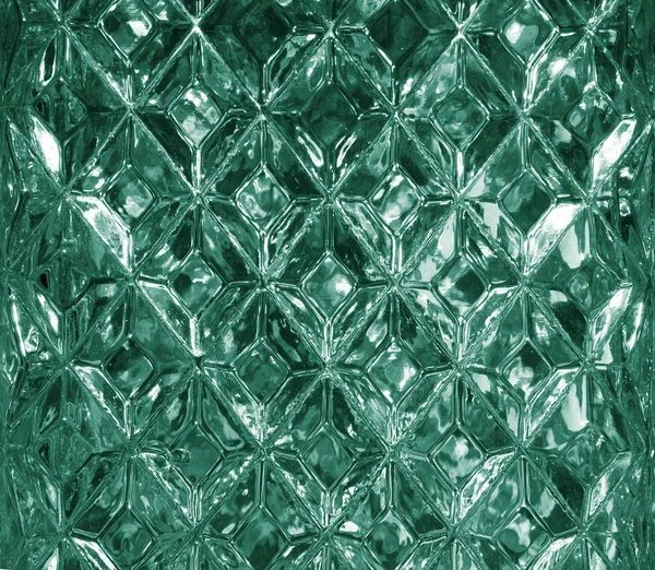 Textura de vidro verde com um padrão de losango. Forma de diamante de vidro transparente. Cristais. Fechar. — Fotografia de Stock
