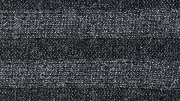 Black and white fabric texture with gray stripes patterns in the middle. Closeup — Stock Photo, Image