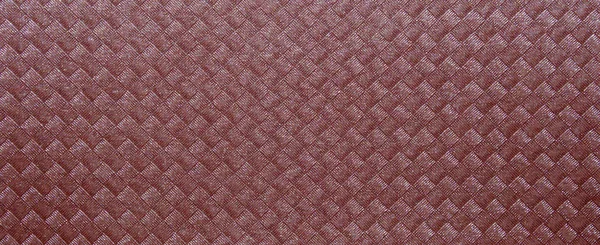 Červené textury s žakárově tkaným vzorem čtverců s pruhy. Closeup — Stock fotografie