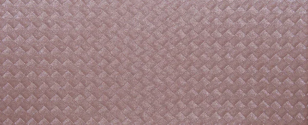 Textura rosa pálida com um padrão tecido de quadrados com listras. Fechar. — Fotografia de Stock