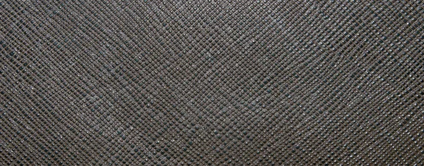 Ljus brun, svart struktur, med konvex cirklar och fyrkanter, olika former. Läder texture. Närbild — Stockfoto