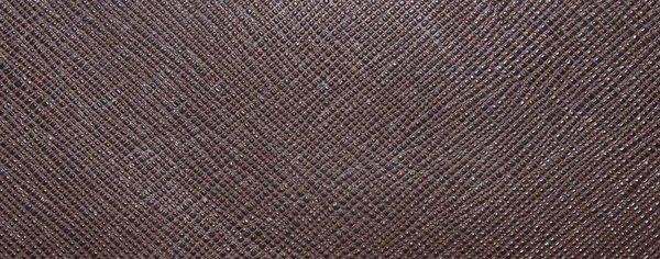 Textura marrom, com círculos convexos e quadrados, formas diferentes. Textura de couro. Fechar. — Fotografia de Stock