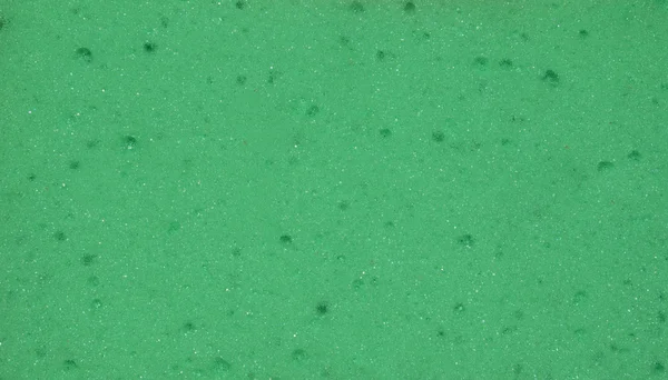 Texture porosa verde. La consistenza della spugna. Primo piano — Foto Stock