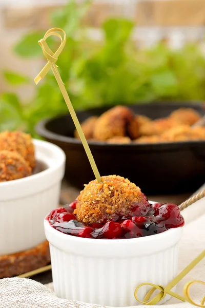 Meatballs with cranberry sauce — Stock Photo, Image
