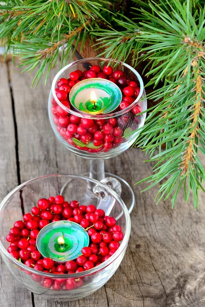 Candles in glasses with cranberries — Stock Photo, Image