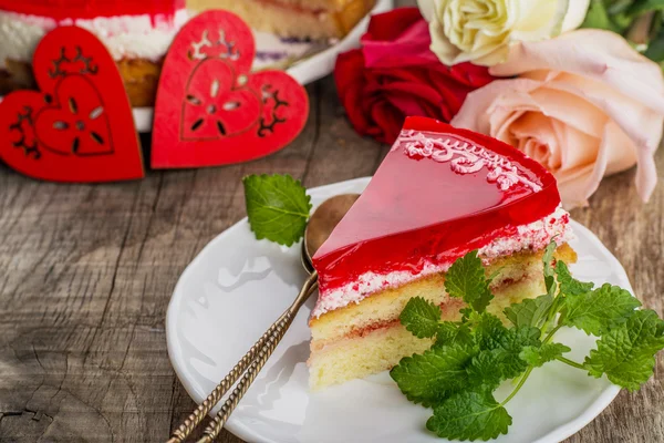 fresh strawberries cake with jelly wooden background