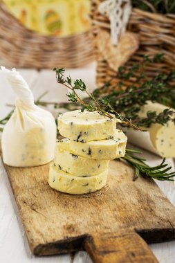 Butter with thyme and rosemary lemon zest. clipart