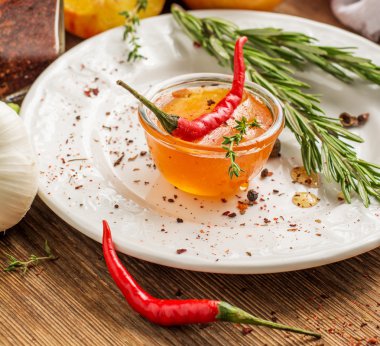 Home sweet fresh hot sauce made with  peaches, pepper