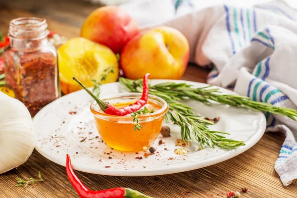 Home sweet fresh hot sauce made with  peaches, pepper — 스톡 사진