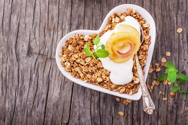 Granola with yogurt and caramel apple slices
